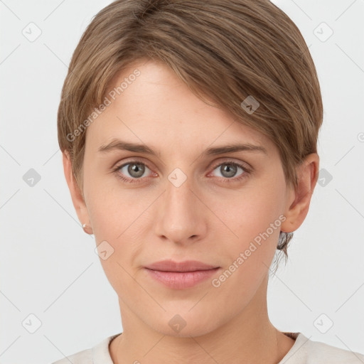 Joyful white young-adult female with short  brown hair and grey eyes