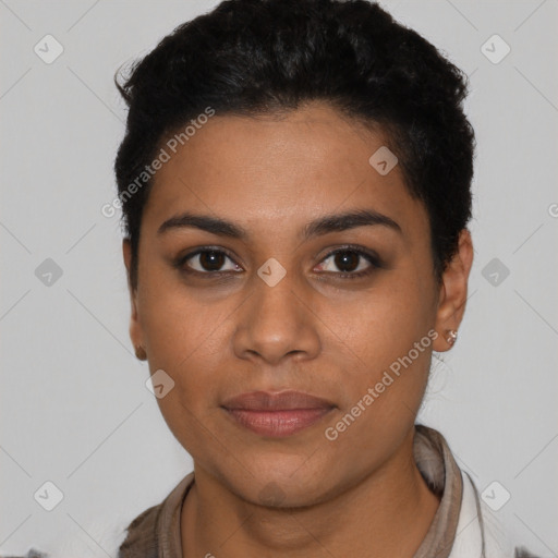 Joyful latino young-adult female with short  black hair and brown eyes