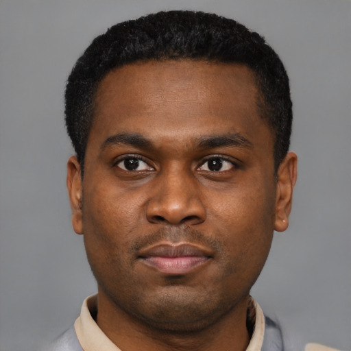 Neutral black young-adult male with short  brown hair and brown eyes