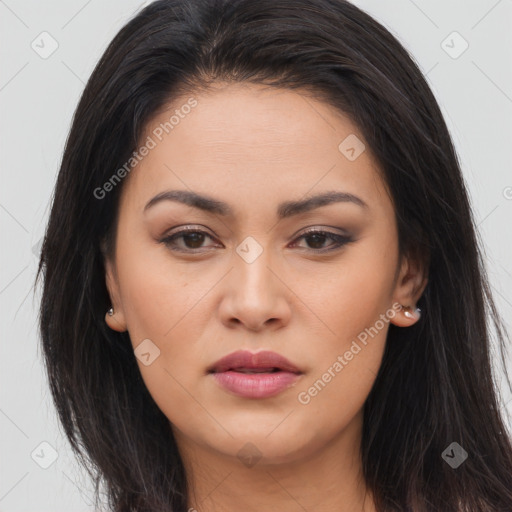 Joyful latino young-adult female with long  brown hair and brown eyes