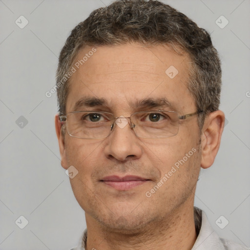 Joyful white middle-aged male with short  brown hair and brown eyes