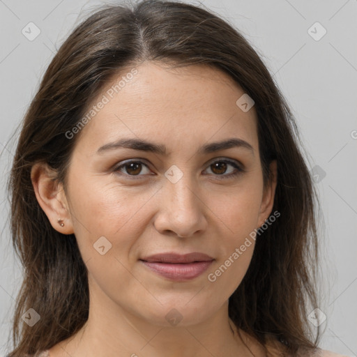 Joyful white young-adult female with long  brown hair and brown eyes