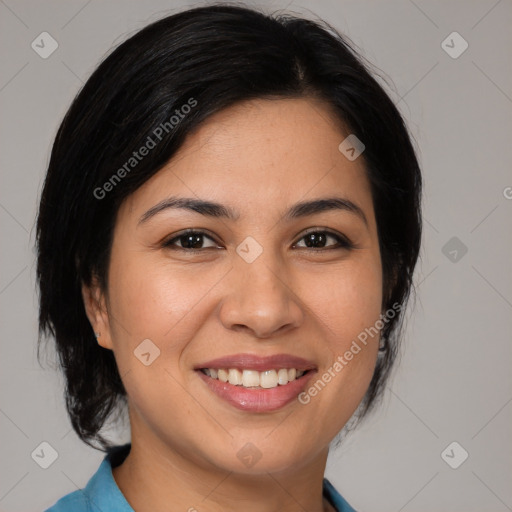 Joyful asian young-adult female with medium  black hair and brown eyes