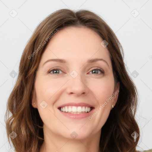 Joyful white young-adult female with long  brown hair and green eyes