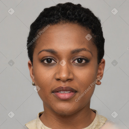 Joyful black young-adult female with short  black hair and brown eyes