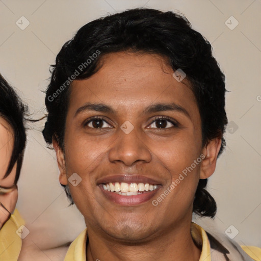 Joyful black young-adult female with medium  brown hair and brown eyes