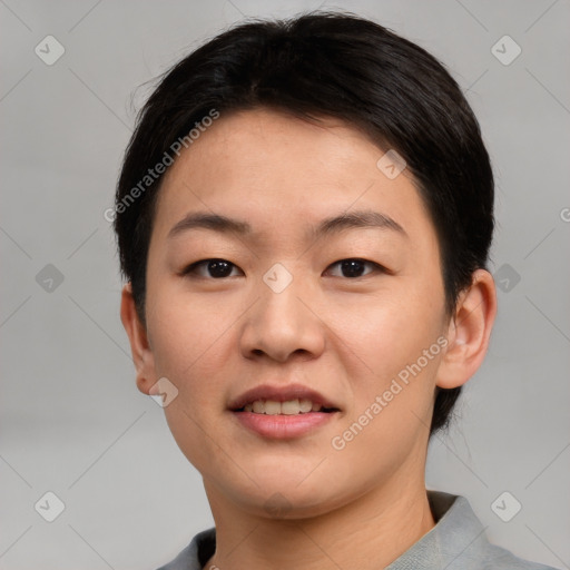 Joyful asian young-adult female with short  brown hair and brown eyes