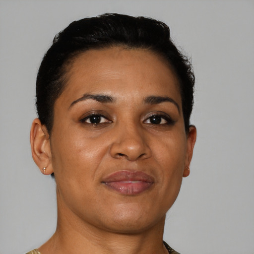 Joyful latino young-adult female with short  brown hair and brown eyes