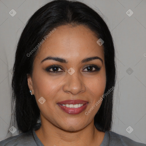 Joyful latino young-adult female with long  brown hair and brown eyes