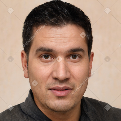 Joyful white adult male with short  brown hair and brown eyes