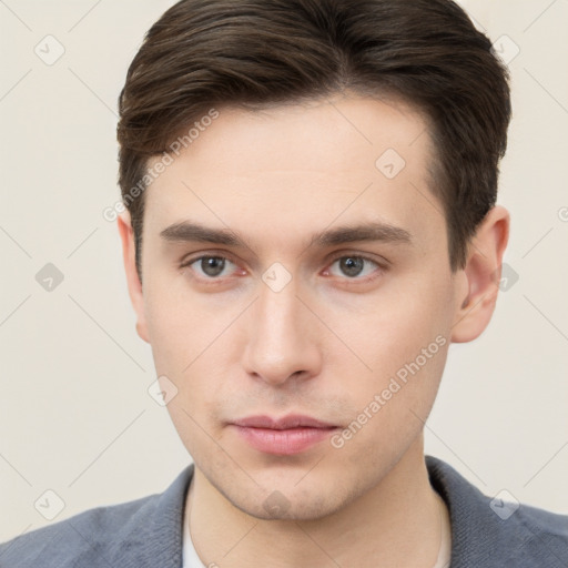 Neutral white young-adult male with short  brown hair and brown eyes