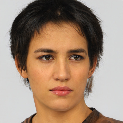 Neutral white young-adult female with short  brown hair and brown eyes