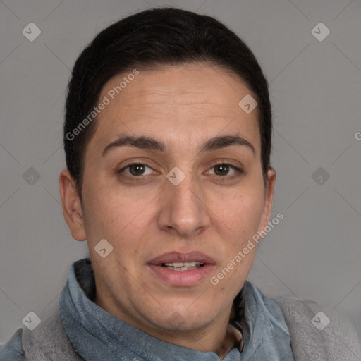 Joyful white adult female with short  brown hair and brown eyes