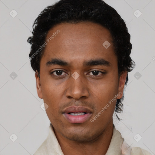 Neutral black young-adult male with short  black hair and brown eyes