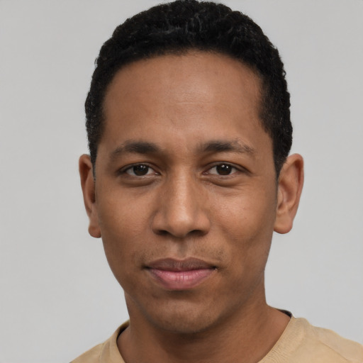 Neutral black young-adult male with short  black hair and brown eyes