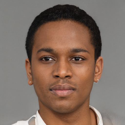 Neutral black young-adult male with short  brown hair and brown eyes