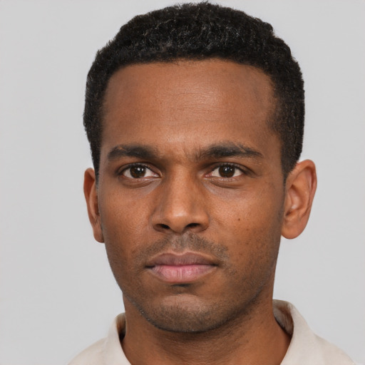 Neutral black young-adult male with short  black hair and brown eyes