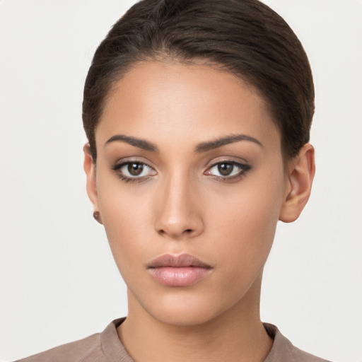 Neutral white young-adult female with short  brown hair and brown eyes