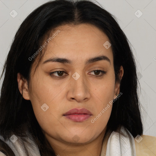 Joyful latino young-adult female with long  brown hair and brown eyes