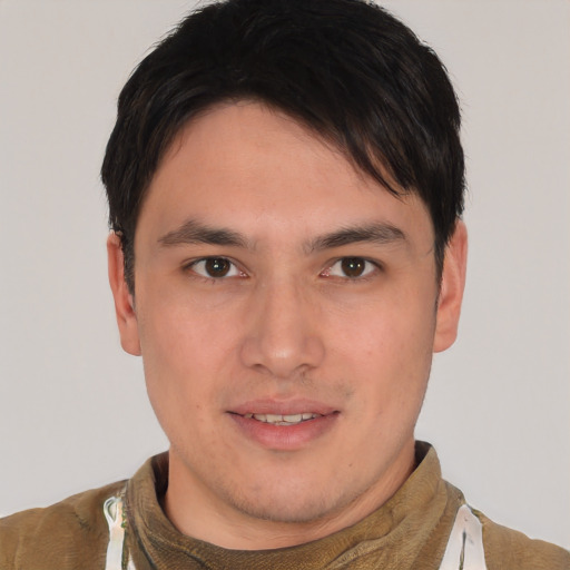 Joyful asian young-adult male with short  brown hair and brown eyes