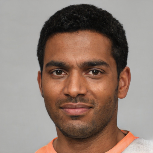 Neutral black young-adult male with short  black hair and brown eyes
