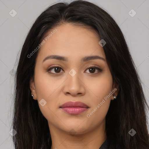 Joyful latino young-adult female with long  brown hair and brown eyes