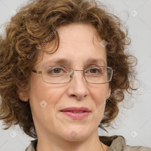 Joyful white adult female with medium  brown hair and blue eyes