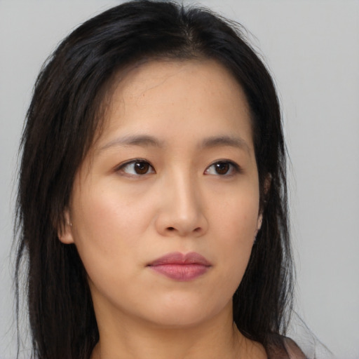 Neutral asian young-adult female with long  brown hair and brown eyes