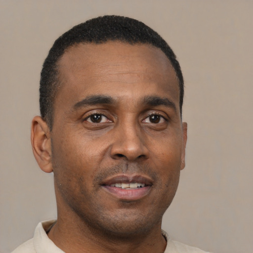 Neutral latino young-adult male with short  brown hair and brown eyes