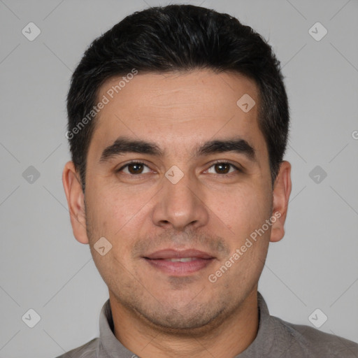 Joyful white young-adult male with short  black hair and brown eyes