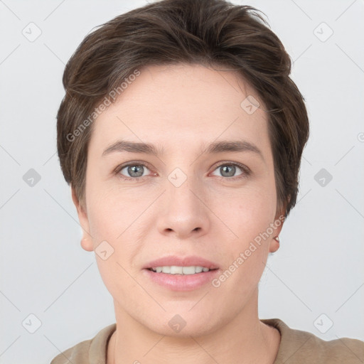 Joyful white young-adult female with short  brown hair and grey eyes