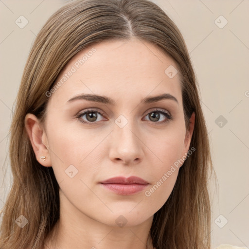 Neutral white young-adult female with long  brown hair and brown eyes