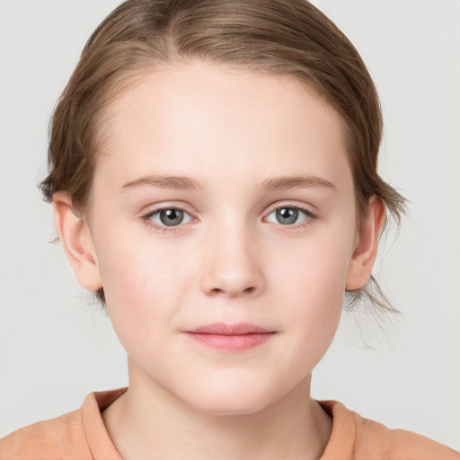 Joyful white child female with medium  brown hair and grey eyes