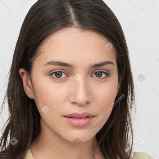 Neutral white young-adult female with long  brown hair and brown eyes