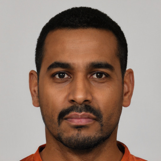 Neutral black young-adult male with short  black hair and brown eyes