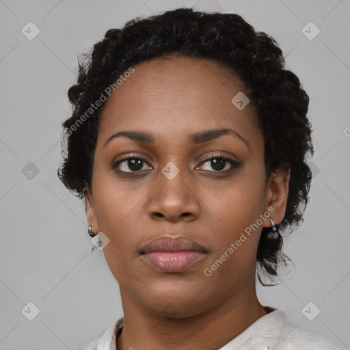 Neutral black young-adult female with short  black hair and brown eyes