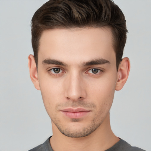 Neutral white young-adult male with short  brown hair and brown eyes