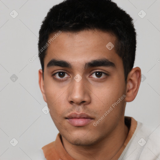 Neutral latino young-adult male with short  black hair and brown eyes