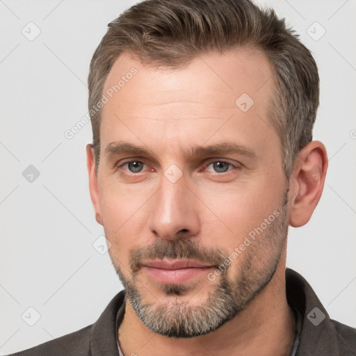 Neutral white adult male with short  brown hair and brown eyes