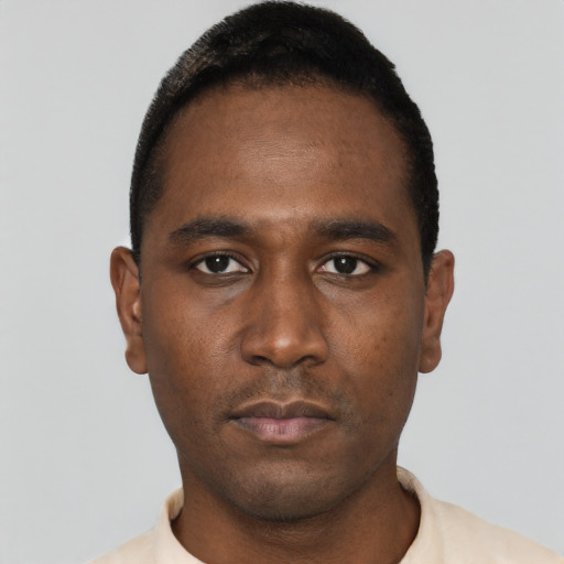 Neutral black young-adult male with short  black hair and brown eyes