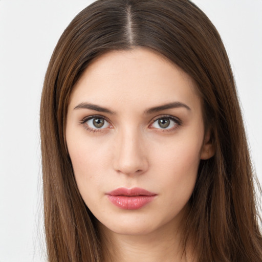 Neutral white young-adult female with long  brown hair and brown eyes