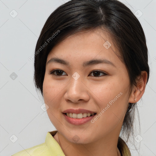 Joyful white young-adult female with medium  brown hair and brown eyes