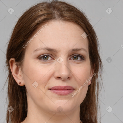 Joyful white young-adult female with medium  brown hair and green eyes