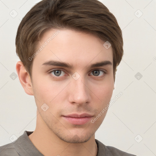 Neutral white young-adult male with short  brown hair and grey eyes