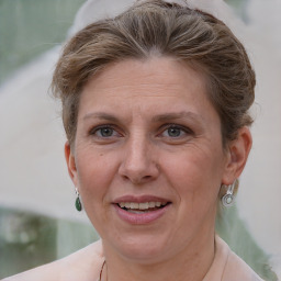 Joyful white adult female with short  brown hair and grey eyes