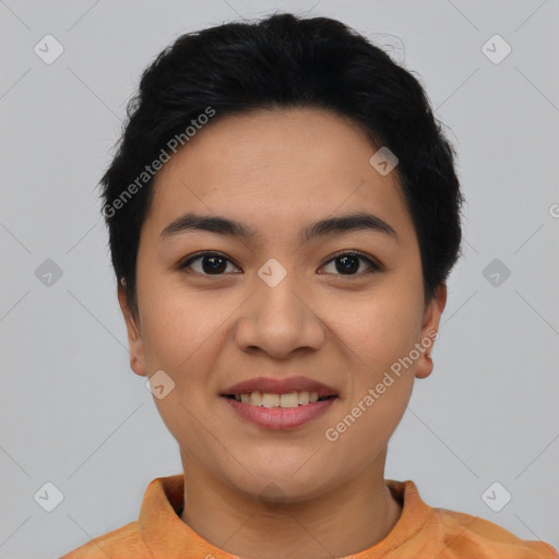 Joyful asian young-adult female with short  black hair and brown eyes