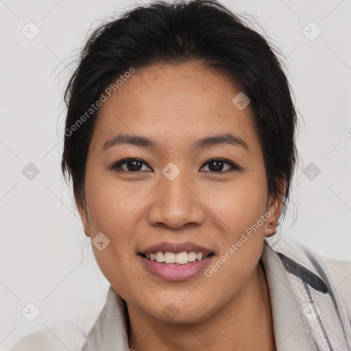 Joyful asian young-adult female with short  brown hair and brown eyes