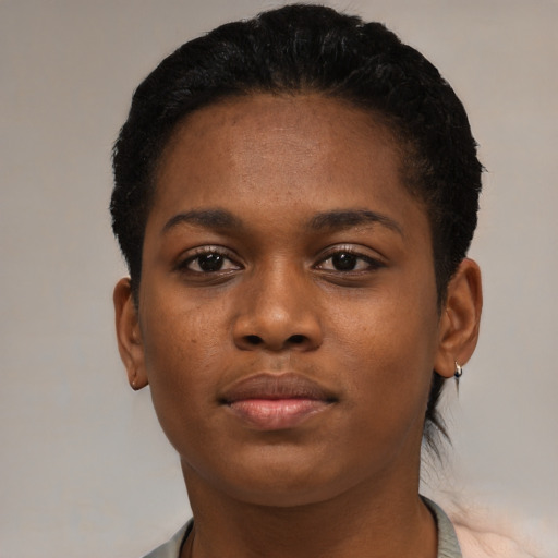 Neutral black young-adult female with short  black hair and brown eyes