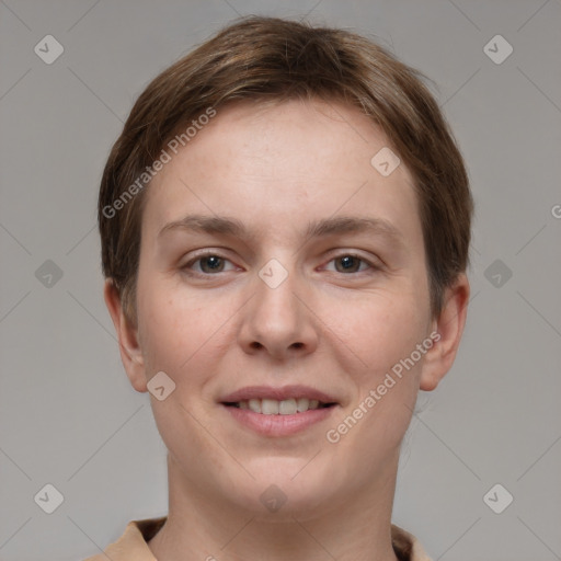 Joyful white young-adult female with short  brown hair and grey eyes