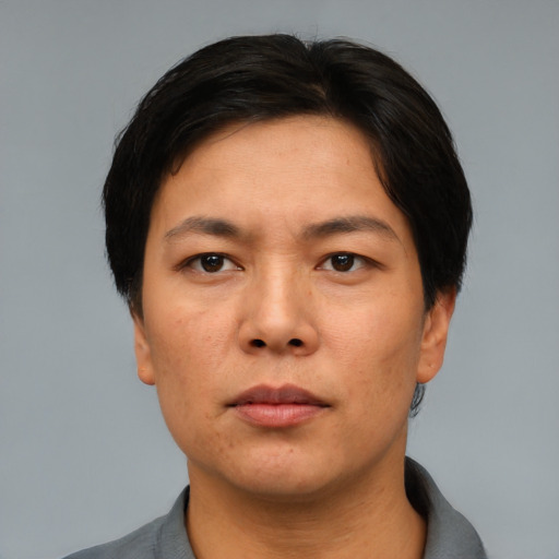 Neutral asian adult male with short  black hair and brown eyes
